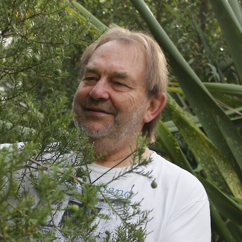 Dr Colin Meurk among native plants